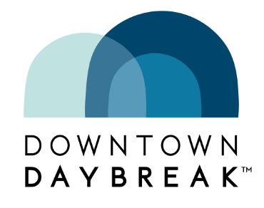 A blue and white logo with an arrow in the middle.