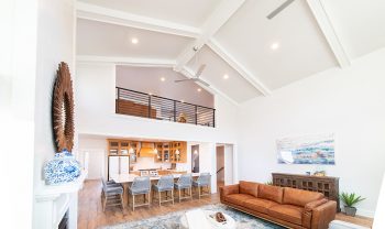 A living room with a vaulted ceiling. A living room with a vaulted ceiling.
