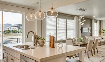 A modern kitchen with a major league floor plan and a view of the mountains. A modern kitchen with a major league floor plan and a view of the mountains.