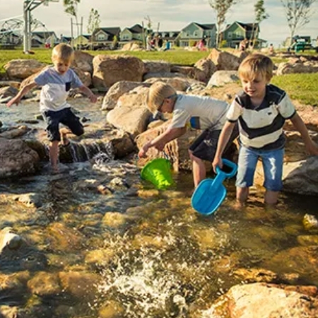 Kids Playing in Creek