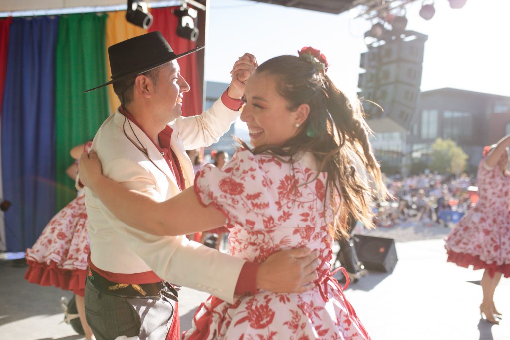 Couple dance on stage at the hispanic festival in South Jordan, Utah.